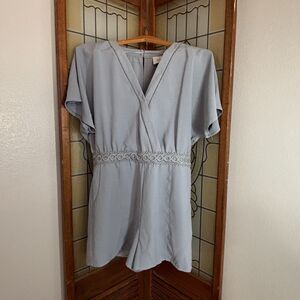 J.O.A Just One Answer Light Blue NWT Romper With Back Cut Out and Pockets Size L